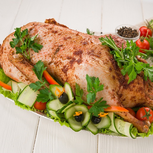 Утка запеченая с яблоками и черносливом