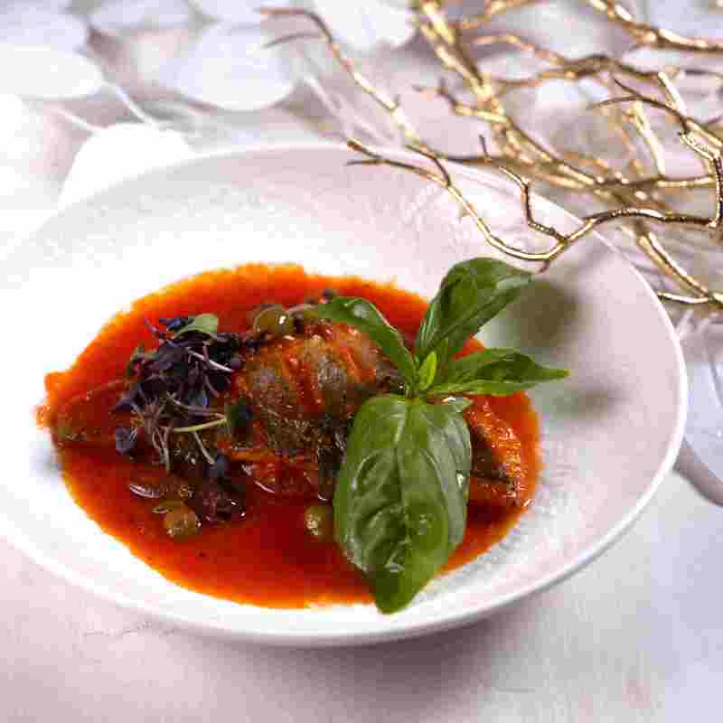 Филе дорадо в соусе путанеска